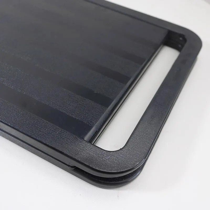 Double large folding hairdressing rearview mirror in black with HD double-sided reflective surface on a table