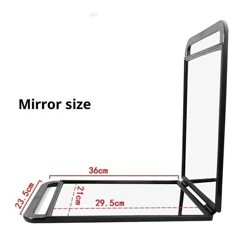 Double large folding hairdressing rearview mirror in black with HD double-sided reflective surface on a table