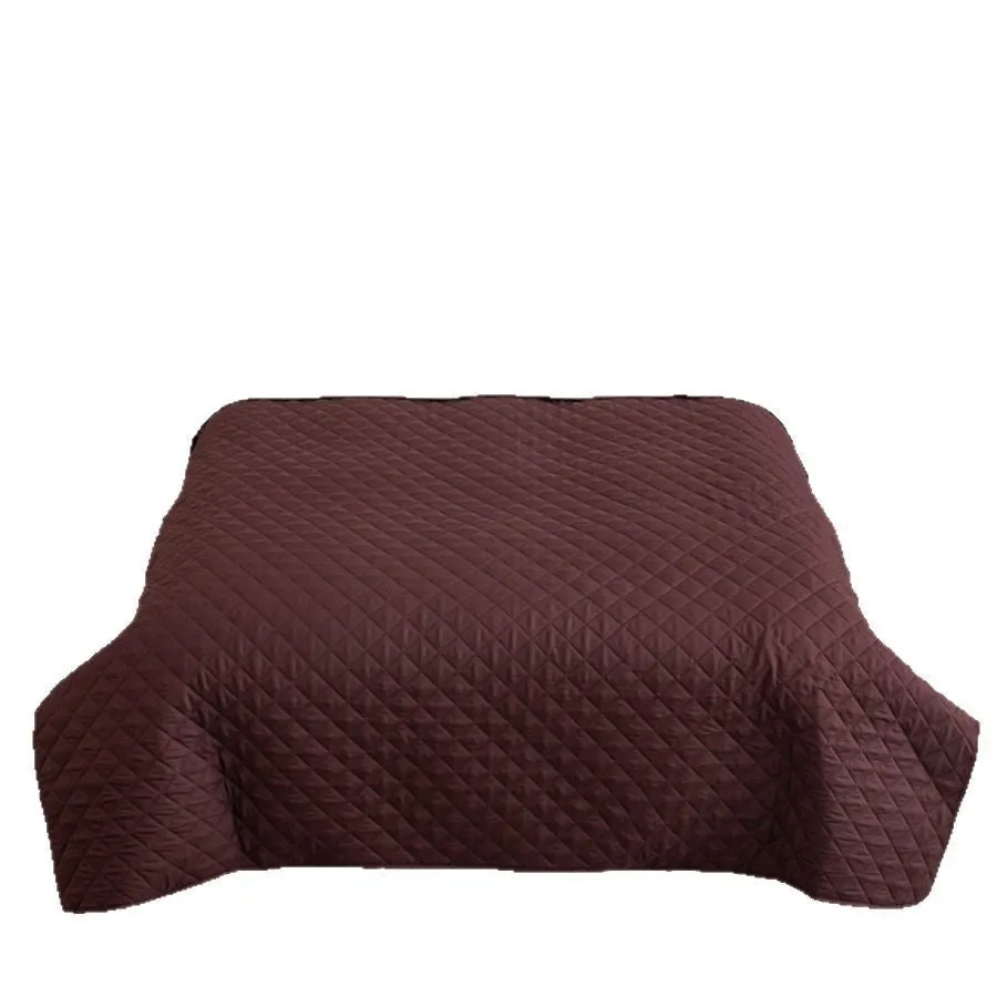 Chemical fibre bedspread with geometric pattern in black, showing sanding finish texture
