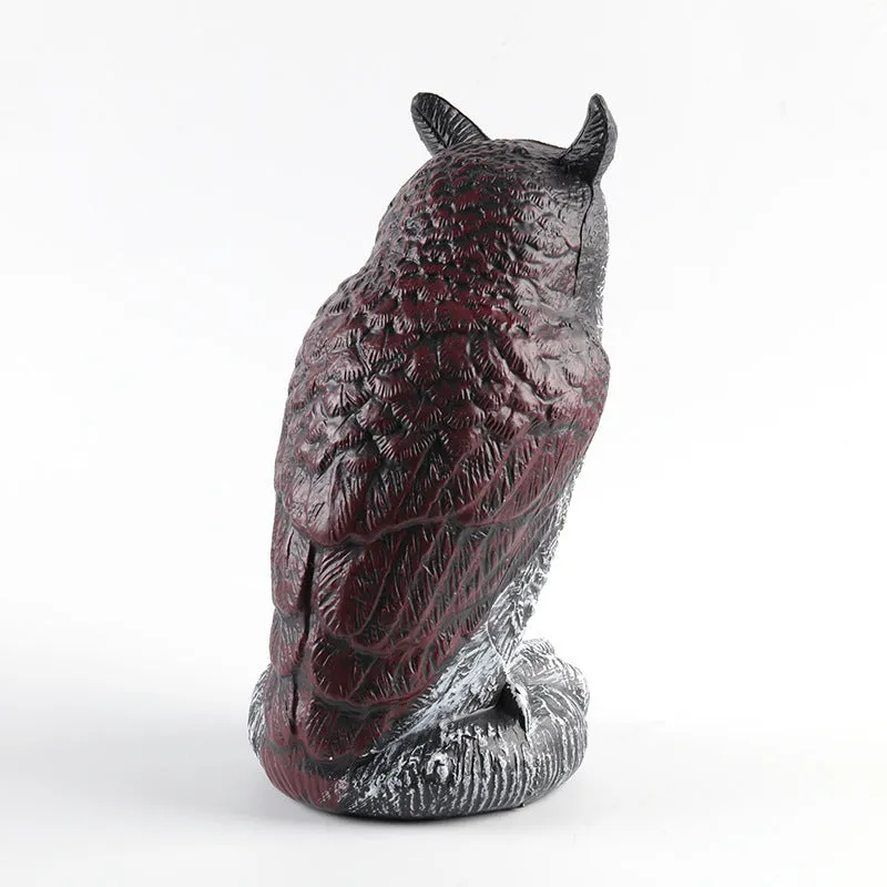 Three-piece set of red artificial PE plastic owl garden ornaments on a white background