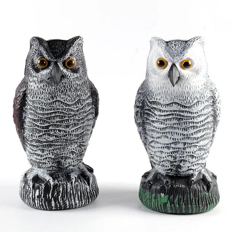 Three-piece set of red artificial PE plastic owl garden ornaments on a white background