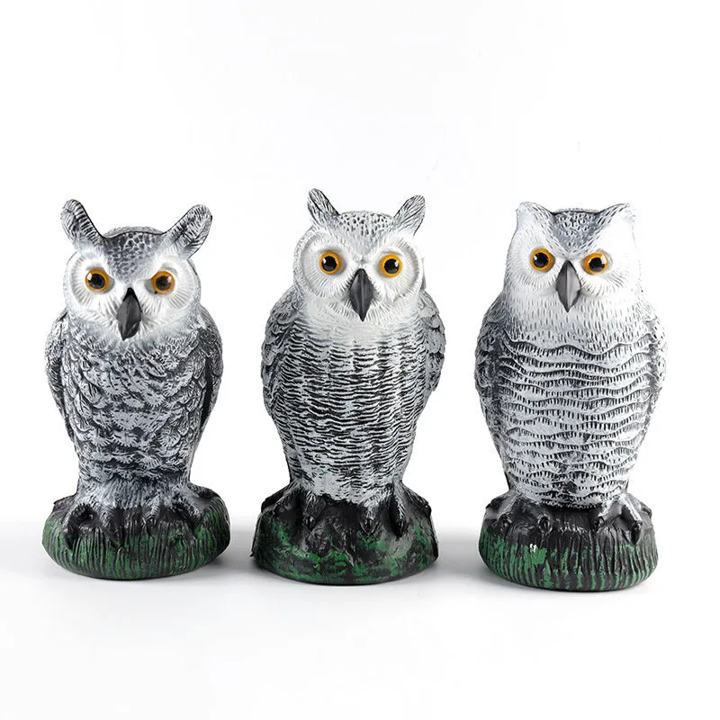 Three-piece set of red artificial PE plastic owl garden ornaments on a white background
