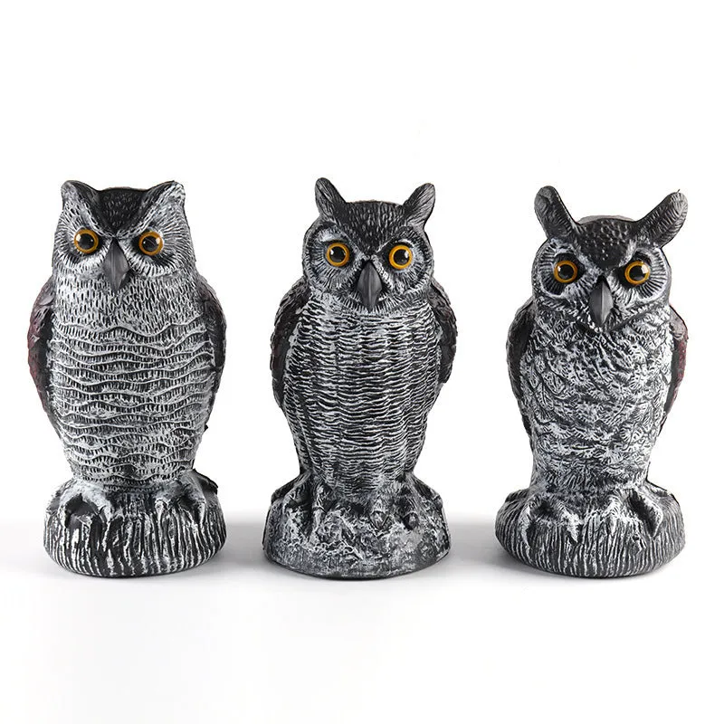 Three-piece set of red artificial PE plastic owl garden ornaments on a white background