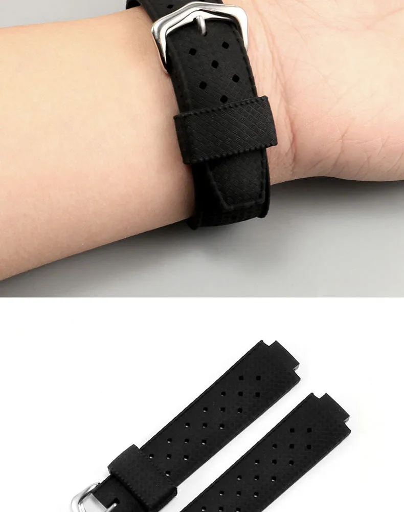 Black silicone watch strap with silver pin buckle and raised mouth design for blue dial watches