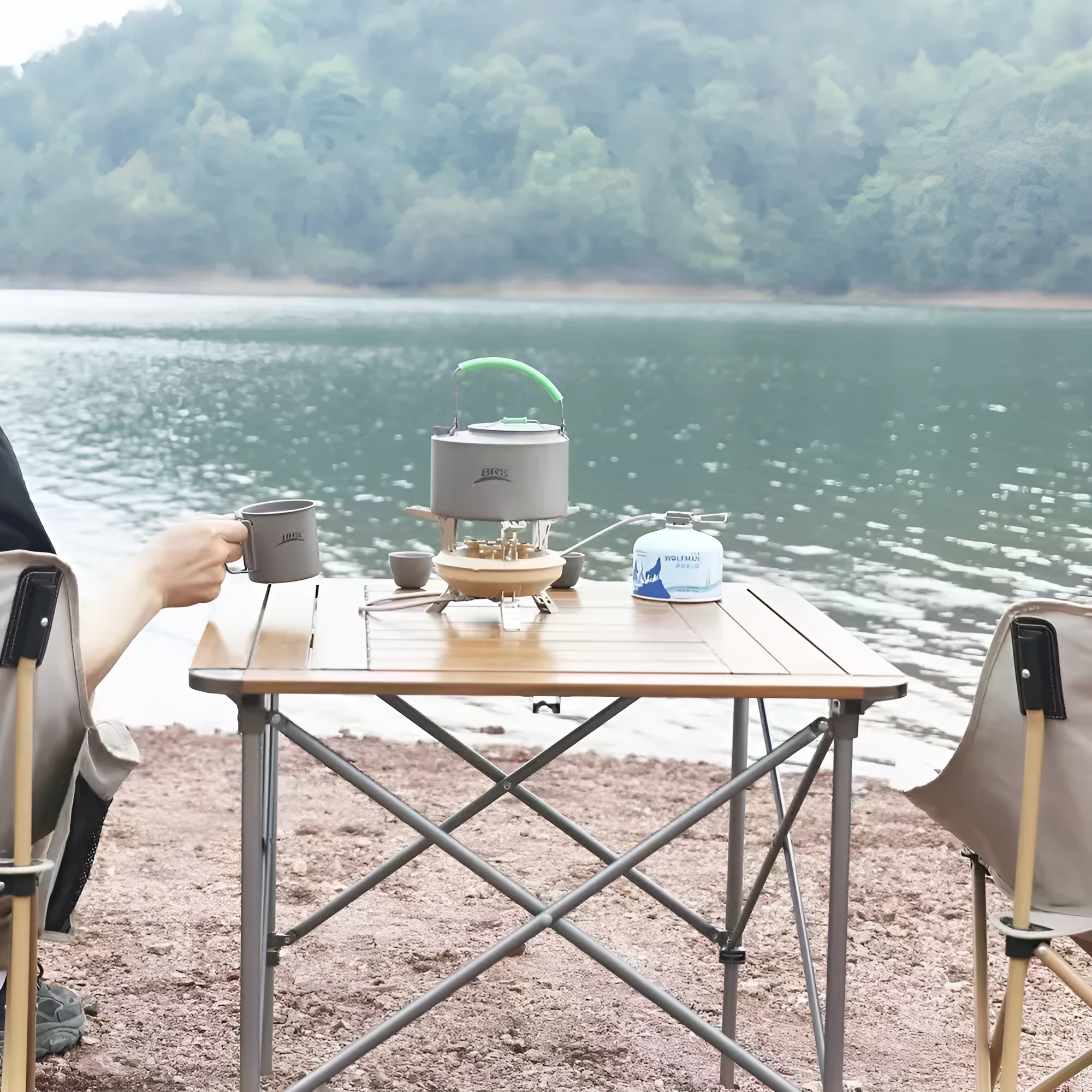 Portable windproof gas stove for camping and picnic in black, compact design for 1-2 people