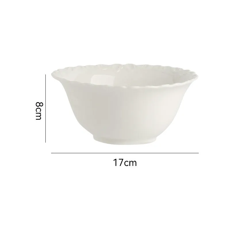 Cream ceramic vintage lace plate with irregular shape and glazed finish in white