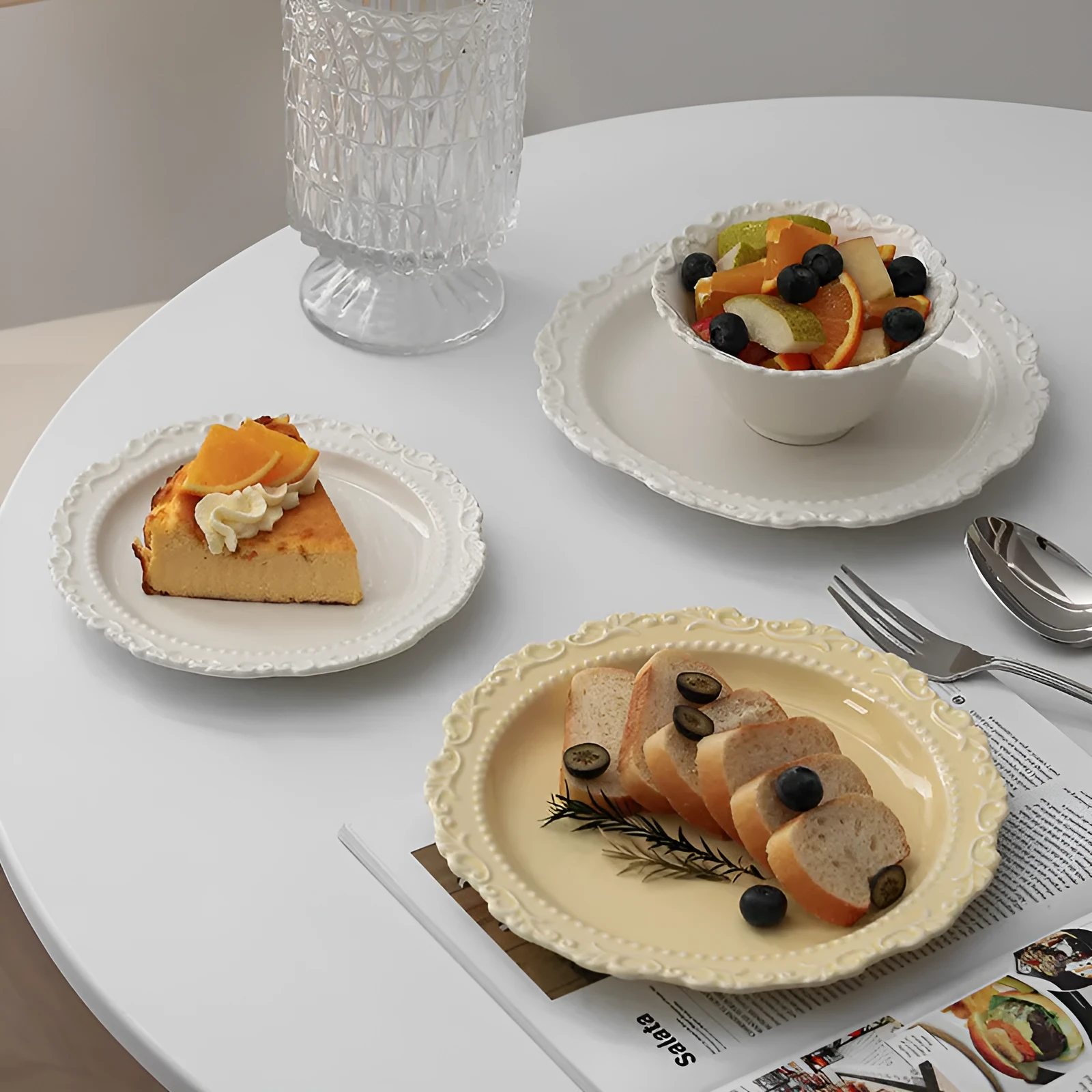 Cream ceramic vintage lace plate with irregular shape and glazed finish in white