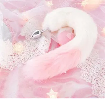 Pink PU leather anal docking plug toy on white background, 10cm length, beginner friendly