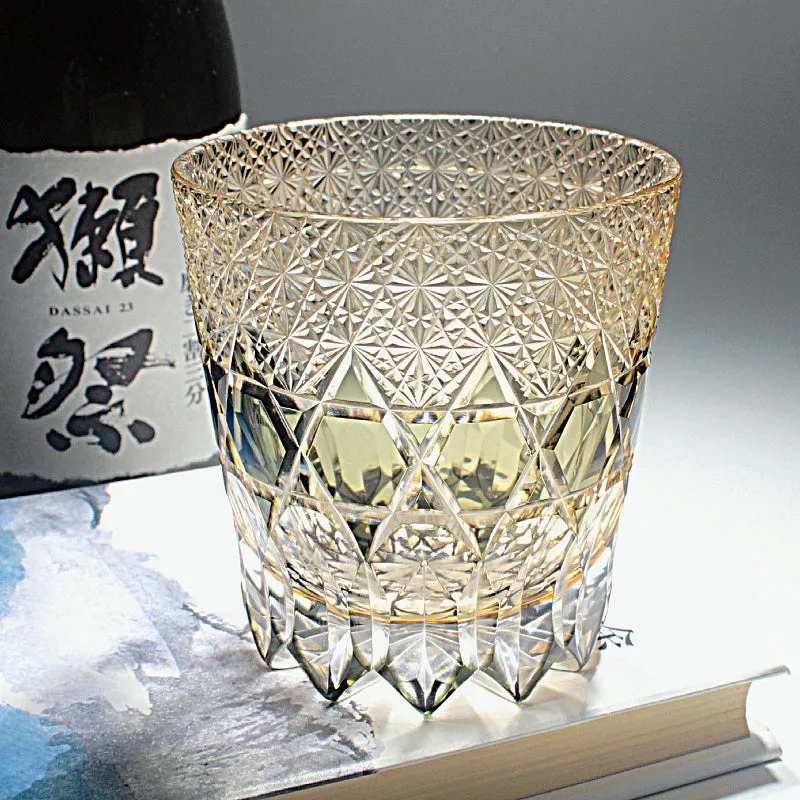 Crystal whiskey glass in simple style, colour Bluish Gray Fluorite, on a table