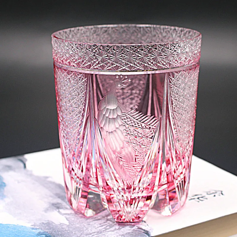 Crystal whiskey glass in simple style, colour Bluish Gray Fluorite, on a table