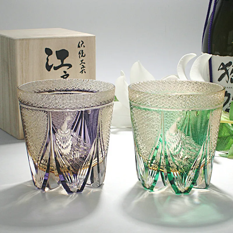 Crystal whiskey glass in simple style, colour Bluish Gray Fluorite, on a table