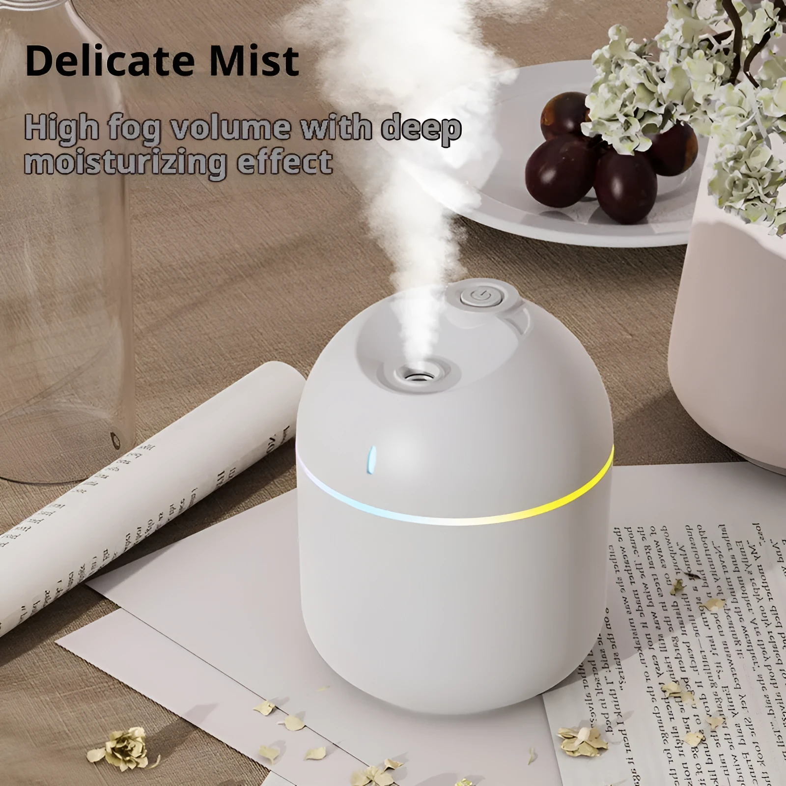 USB desktop humidifier with large spray, mute operation, and colour light in green plastic body