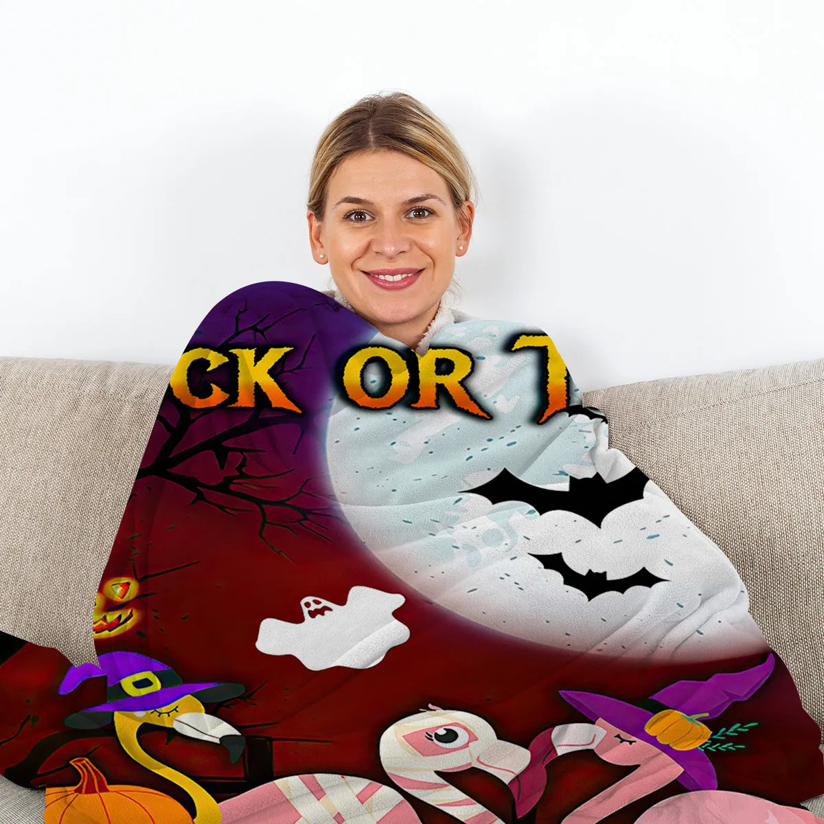 Purple flannel throw blanket with Halloween flamingo print, soft velvet texture, hemmed edges, available in multiple sizes