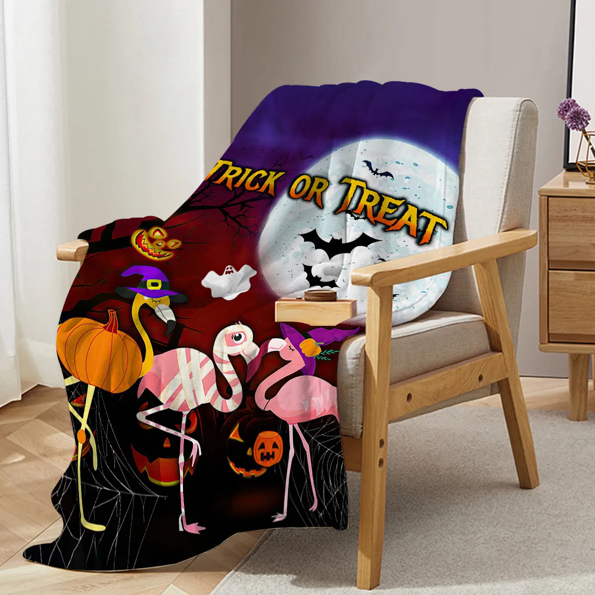 Purple flannel throw blanket with Halloween flamingo print, soft velvet texture, hemmed edges, available in multiple sizes