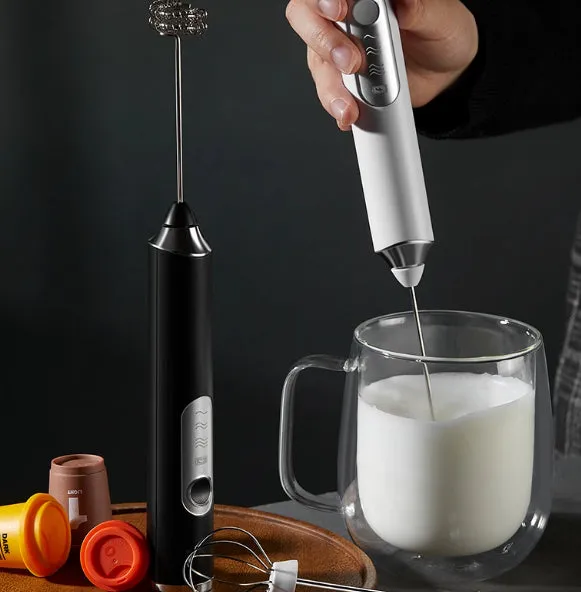 Electric coffee frother in Phantom Night Black with two frothing heads and cordless handheld design