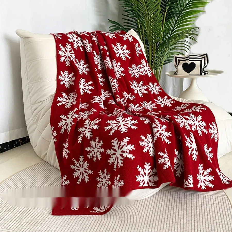 Personalised acrylic Christmas blanket showing reindeer and snowflake print options in two sizes.