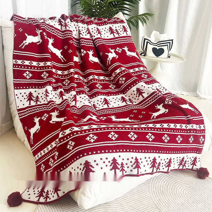Personalised acrylic Christmas blanket showing reindeer and snowflake print options in two sizes.