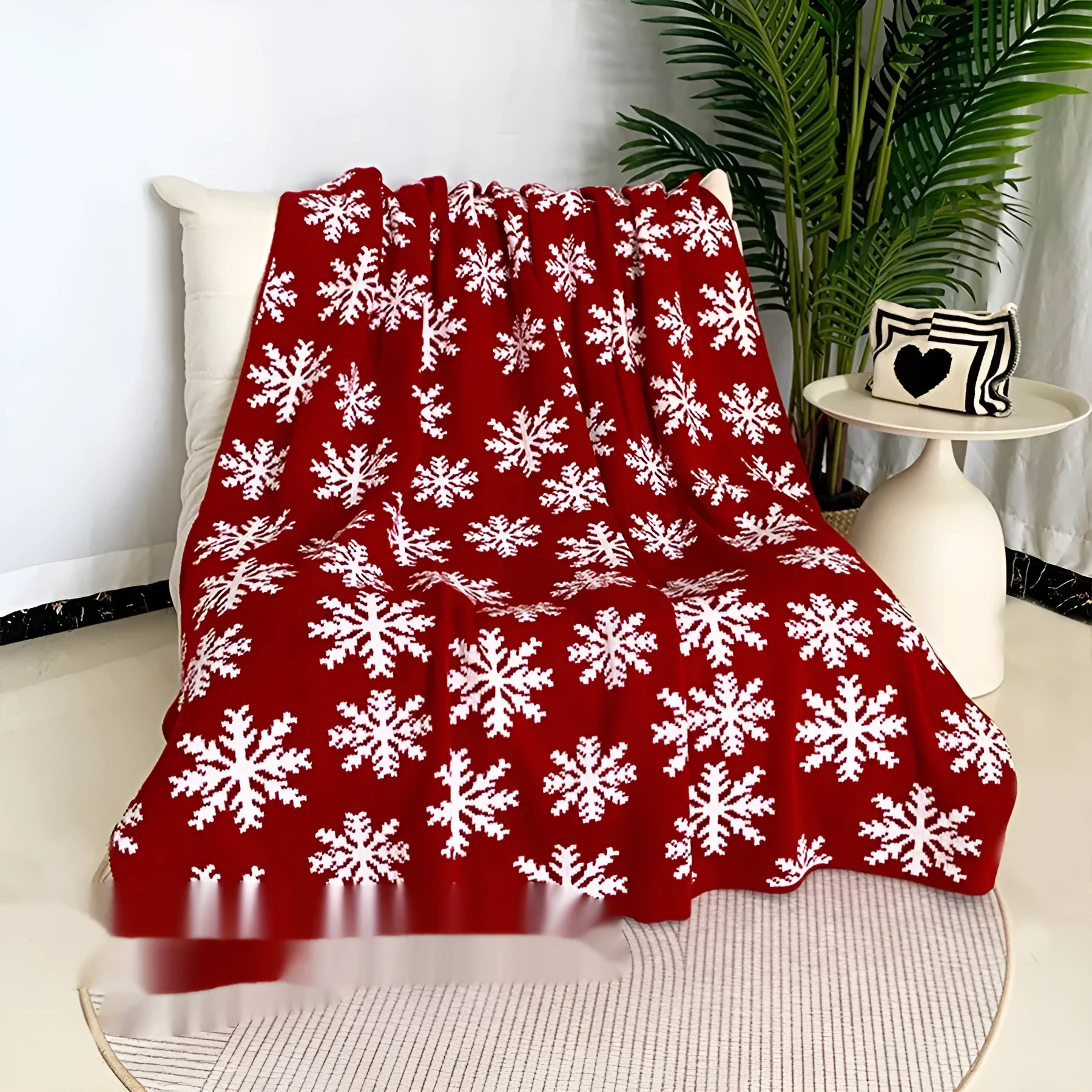 Personalised acrylic Christmas blanket showing reindeer and snowflake print options in two sizes.
