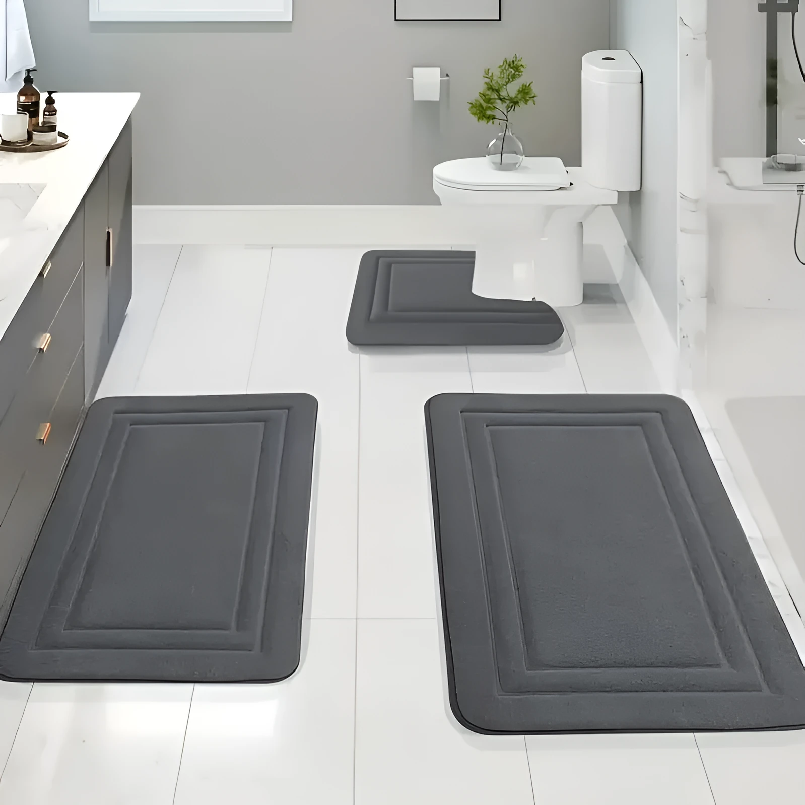 Three-piece PVC bathroom floor mat set in grey stripes - one large, one medium, one small mat for bathroom use