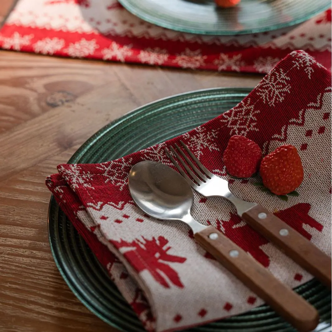 Home Christmas jacquard table runner in polyester cotton with jacquard red deer flat hem design on a table setting