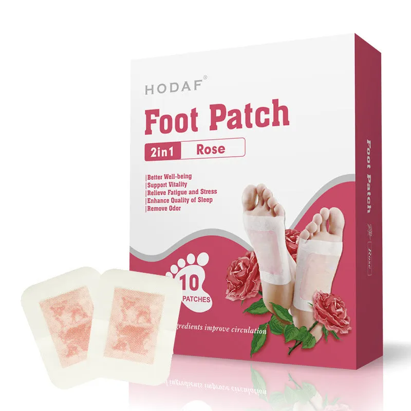 Wood vinegar foot patch with mint scent for adults, 10 pieces per box, placed on a foot sole.