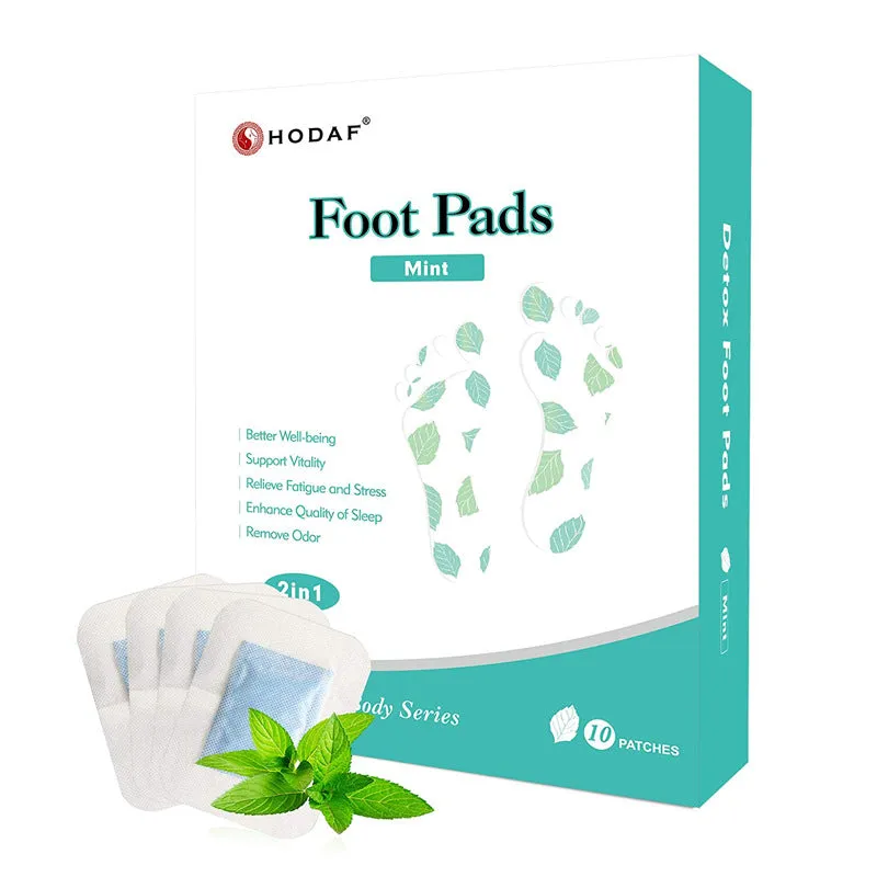 Wood vinegar foot patch with mint scent for adults, 10 pieces per box, placed on a foot sole.