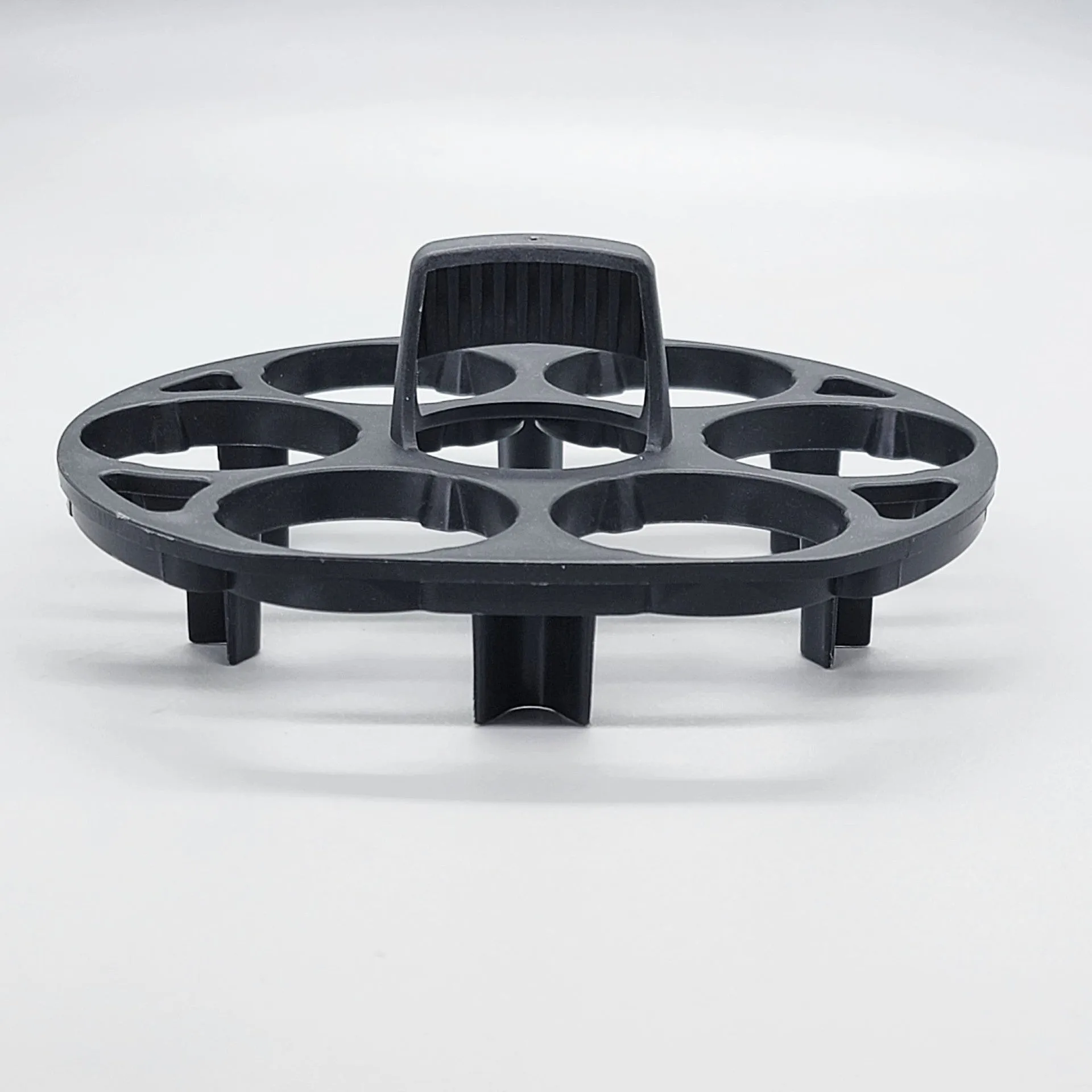 Black plastic egg holder basket with retainer function, dimensions 13.8 x 12.6 x 5.7 cm