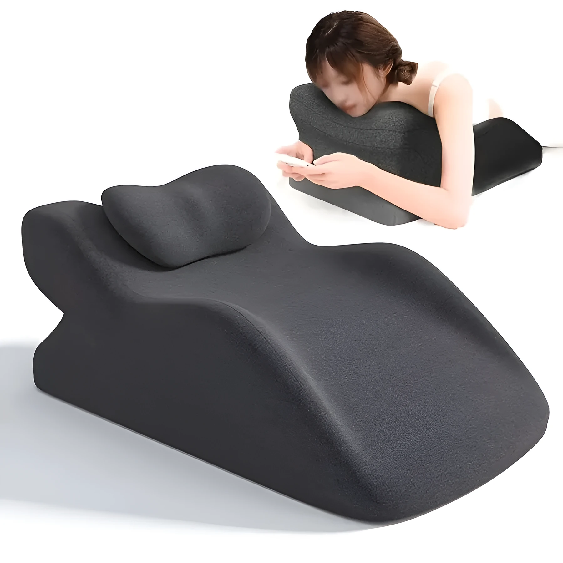 A prone position stomach sleeping pillow shown in a light grey colour, designed for use while reading in bed.