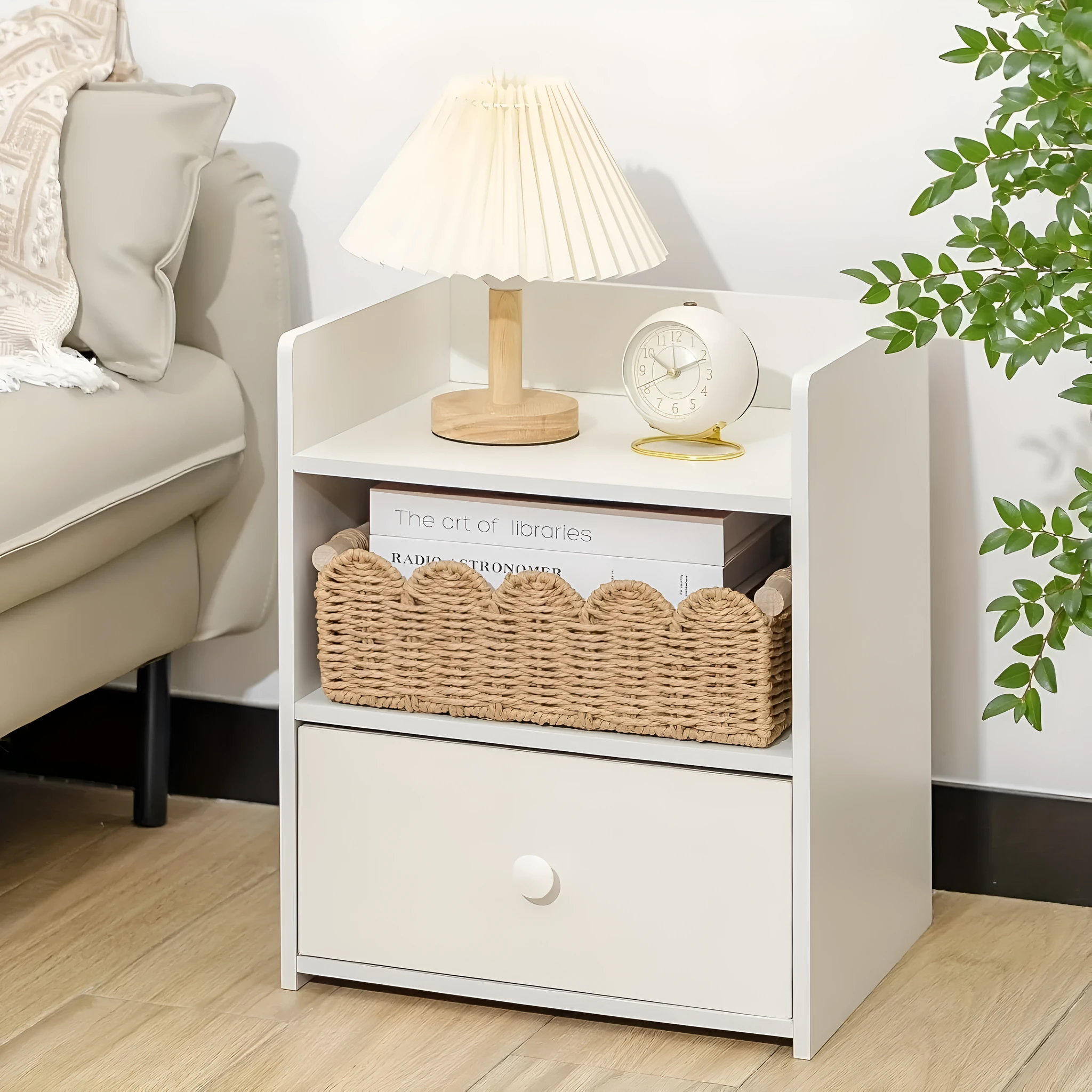 Rectangular woven paper storage basket in a neutral colour on a wooden tabletop.