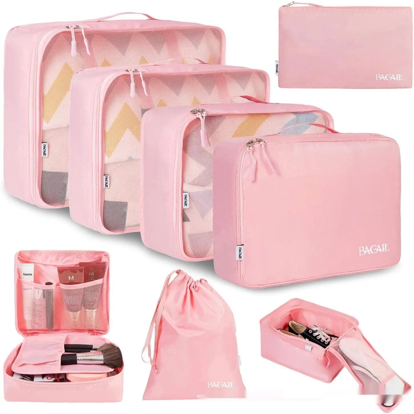 Set of eight cubic packing organisers in assorted solid colours including beige, black, and pink.