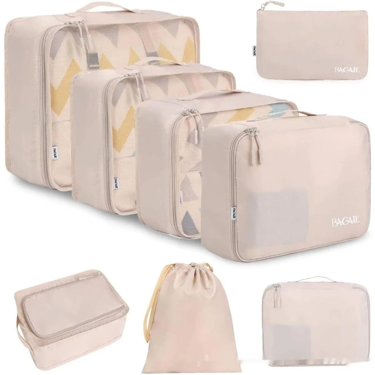 Set of eight cubic packing organisers in assorted solid colours including beige, black, and pink.