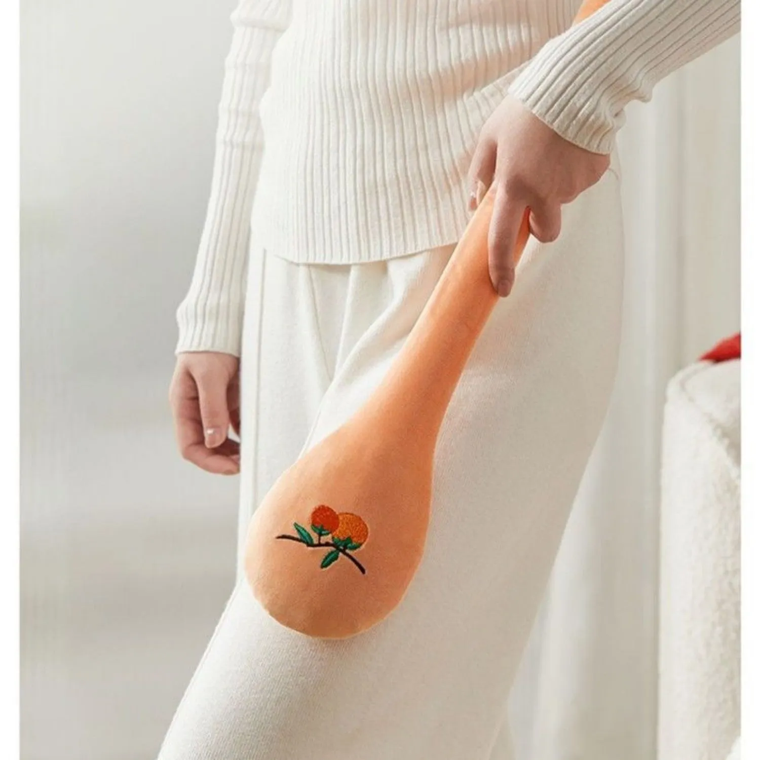 48 cm persimmon colour percussion massage stick with meridian flap design