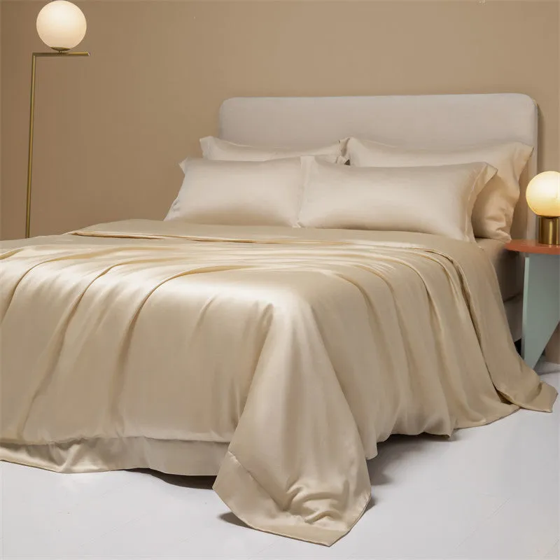 Luxury Lenzing Tencel duvet cover and pillowcase set in Aurora Blue colour on a modern bed.