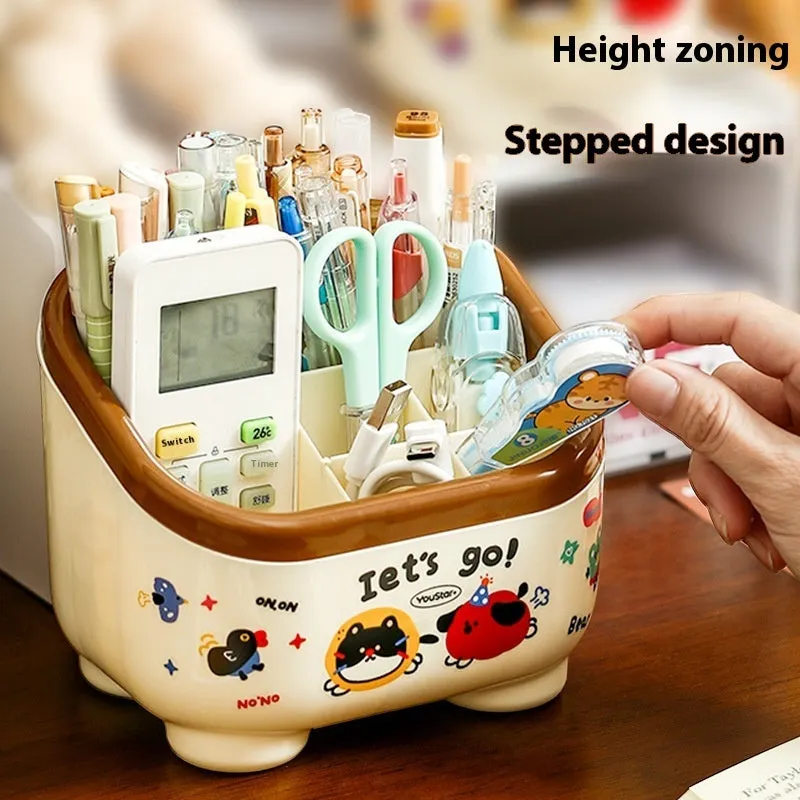 Cartoon-style plastic desktop organiser with grid compartments and red or brown stickers.