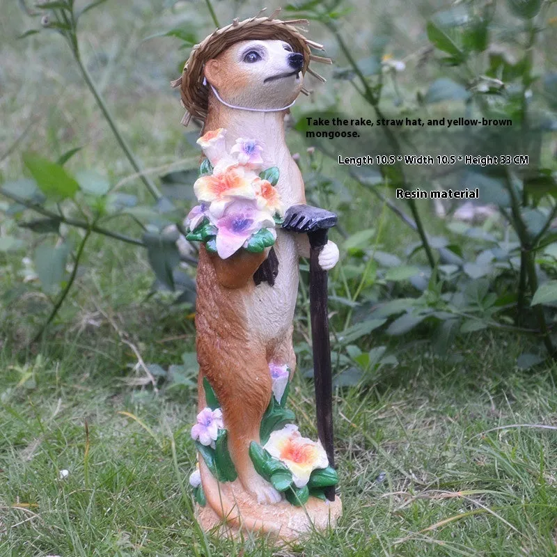 Straw hat mongoose garden ornament with mother and baby figures
