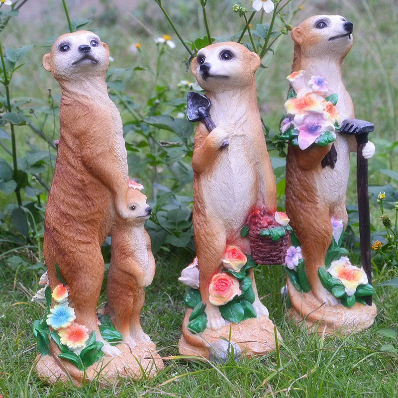 Straw hat mongoose garden ornament with mother and baby figures