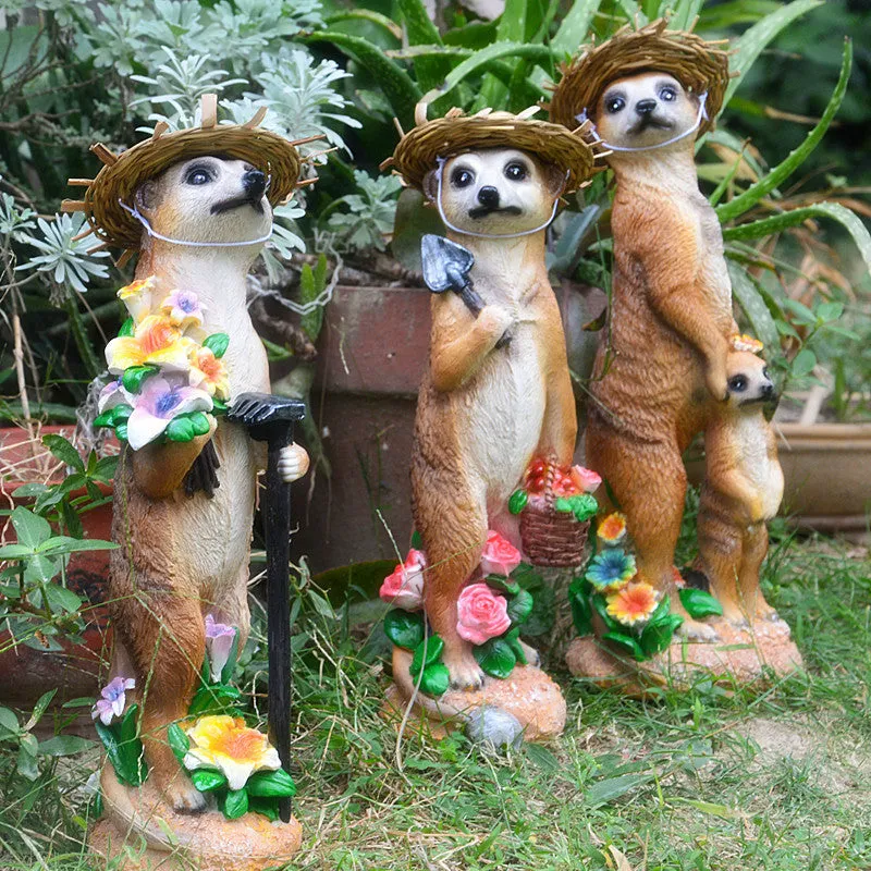 Straw hat mongoose garden ornament with mother and baby figures