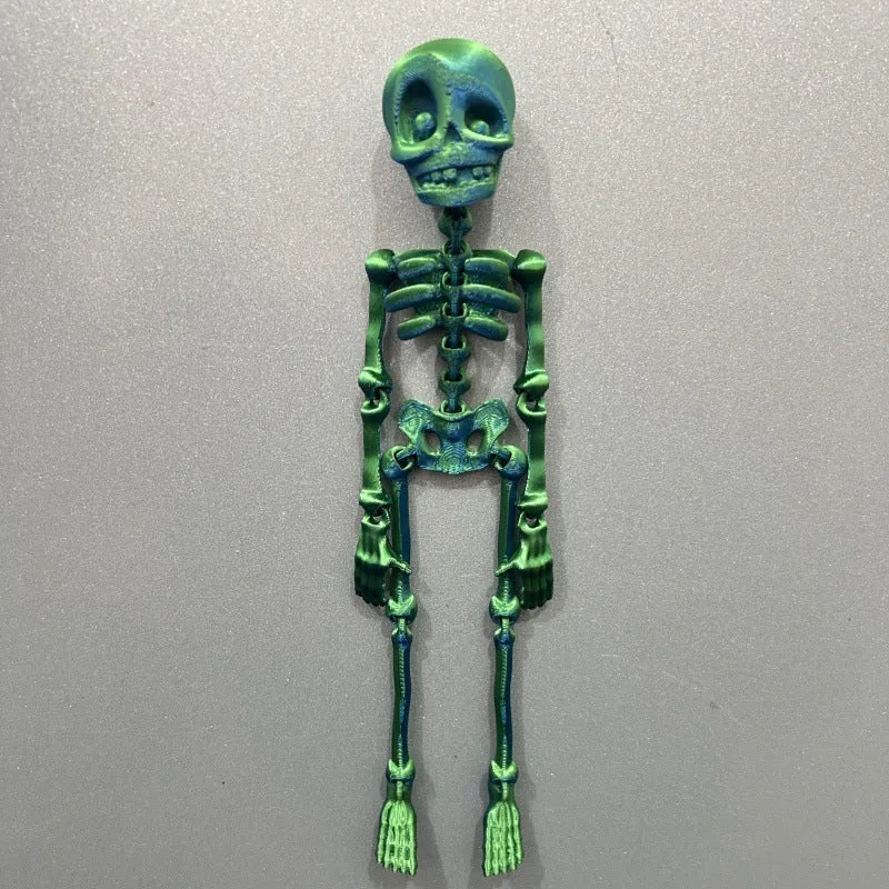 3D printed skull refrigerator magnet in multiple colours measuring 18cm high by 4.5cm wide