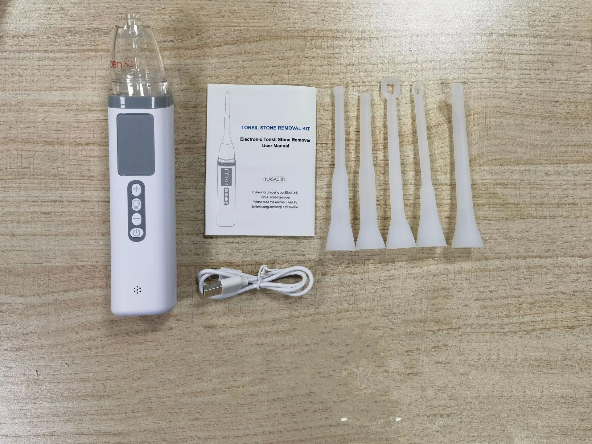 Cross-border tonsillar extractor oral cleaning tool for dental stone removal in milky white