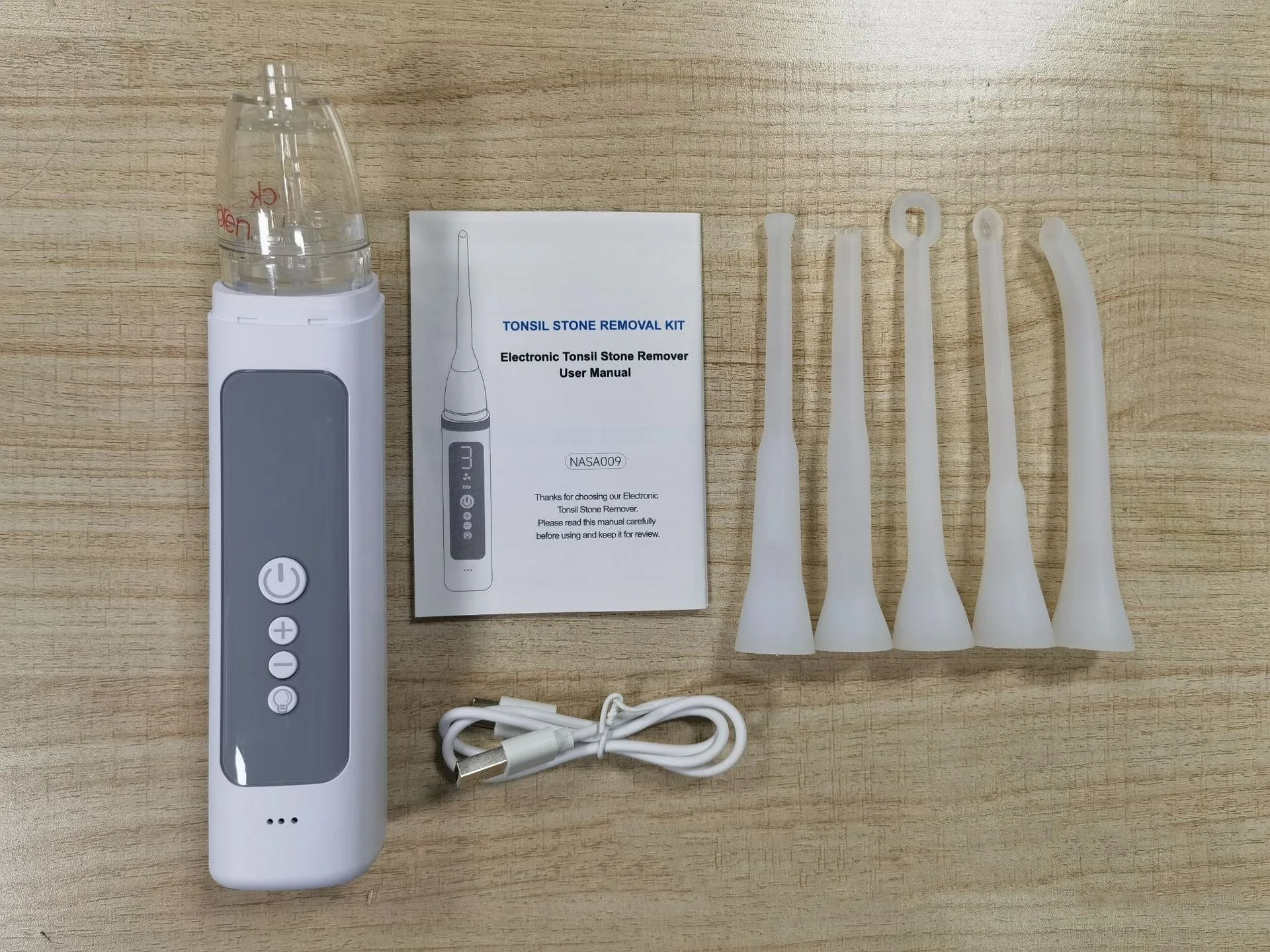 Cross-border tonsillar extractor oral cleaning tool for dental stone removal in milky white