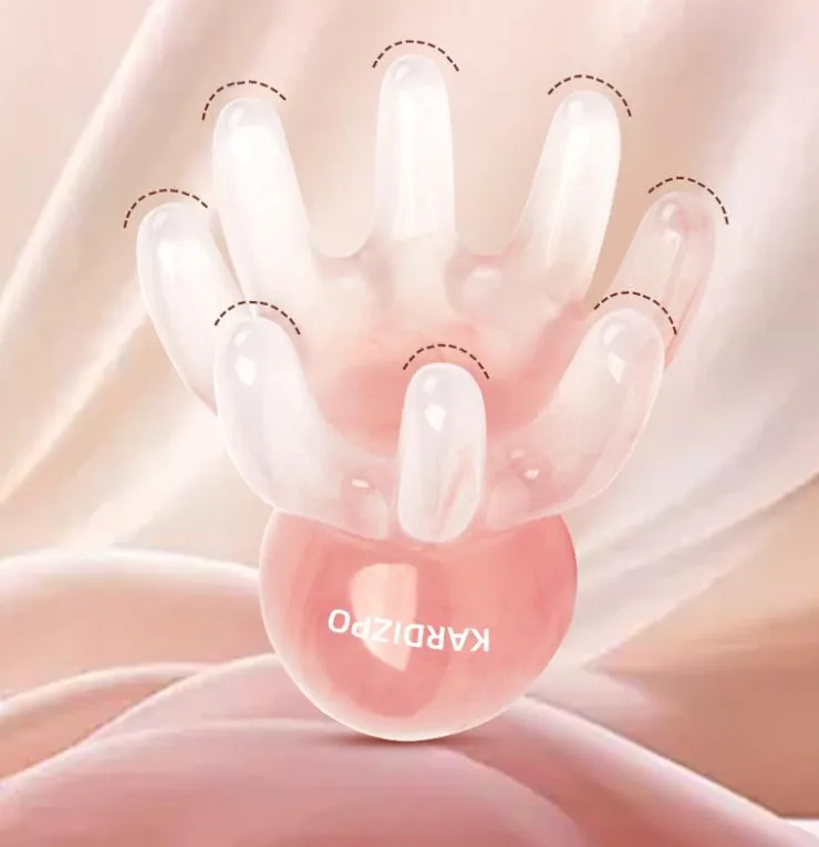 Pink octopus-shaped massage comb for periocular meridian acupressure with curved arms and storage bag