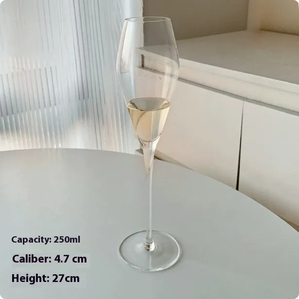 Clear glass French champagne goblet in one of seven styles: flute, tulip, waist, bevel, era or coupe.