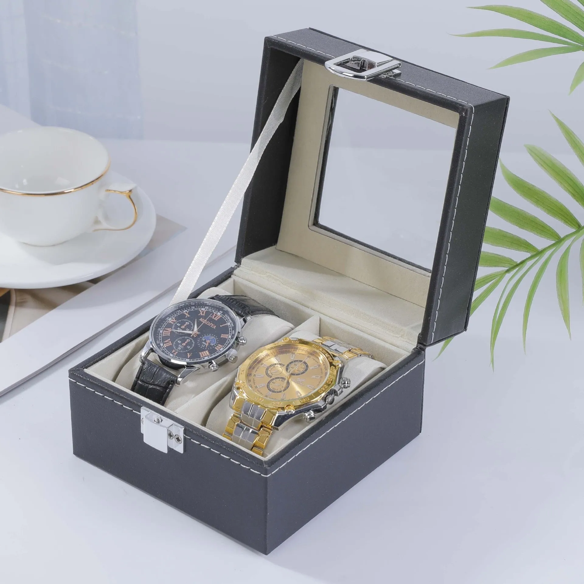 Grey high-grade leather watch storage box with see-through lid showing multiple watch slots.