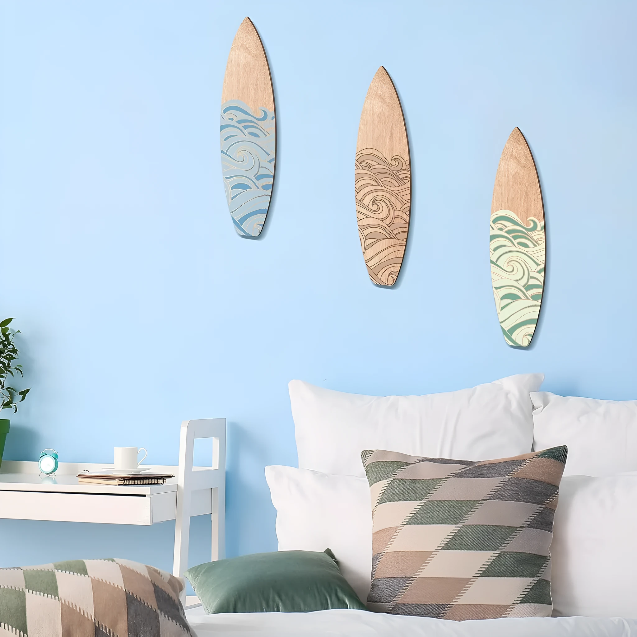 Three wooden surfboard wall decorations with boxwood construction displayed together