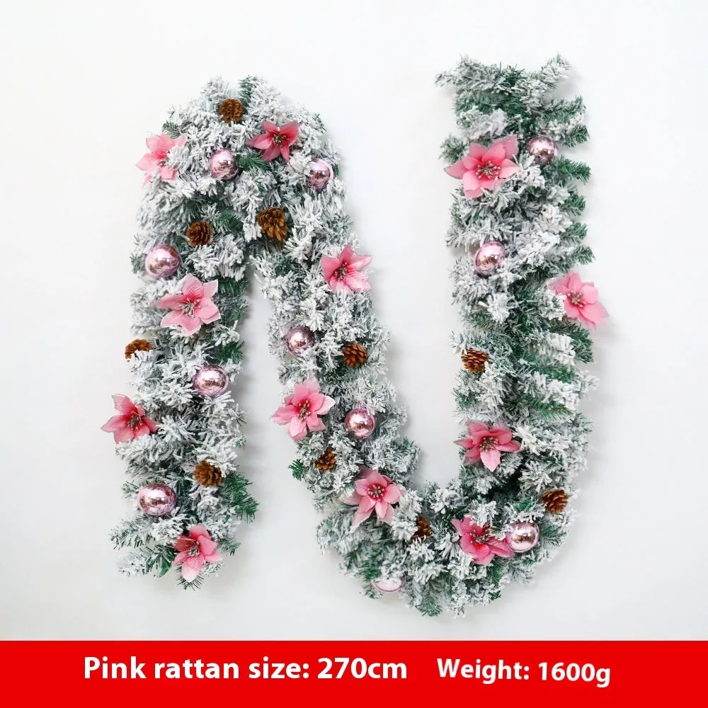 American-style red flocked PVC rattan Christmas garland decoration draped over a mantelpiece.