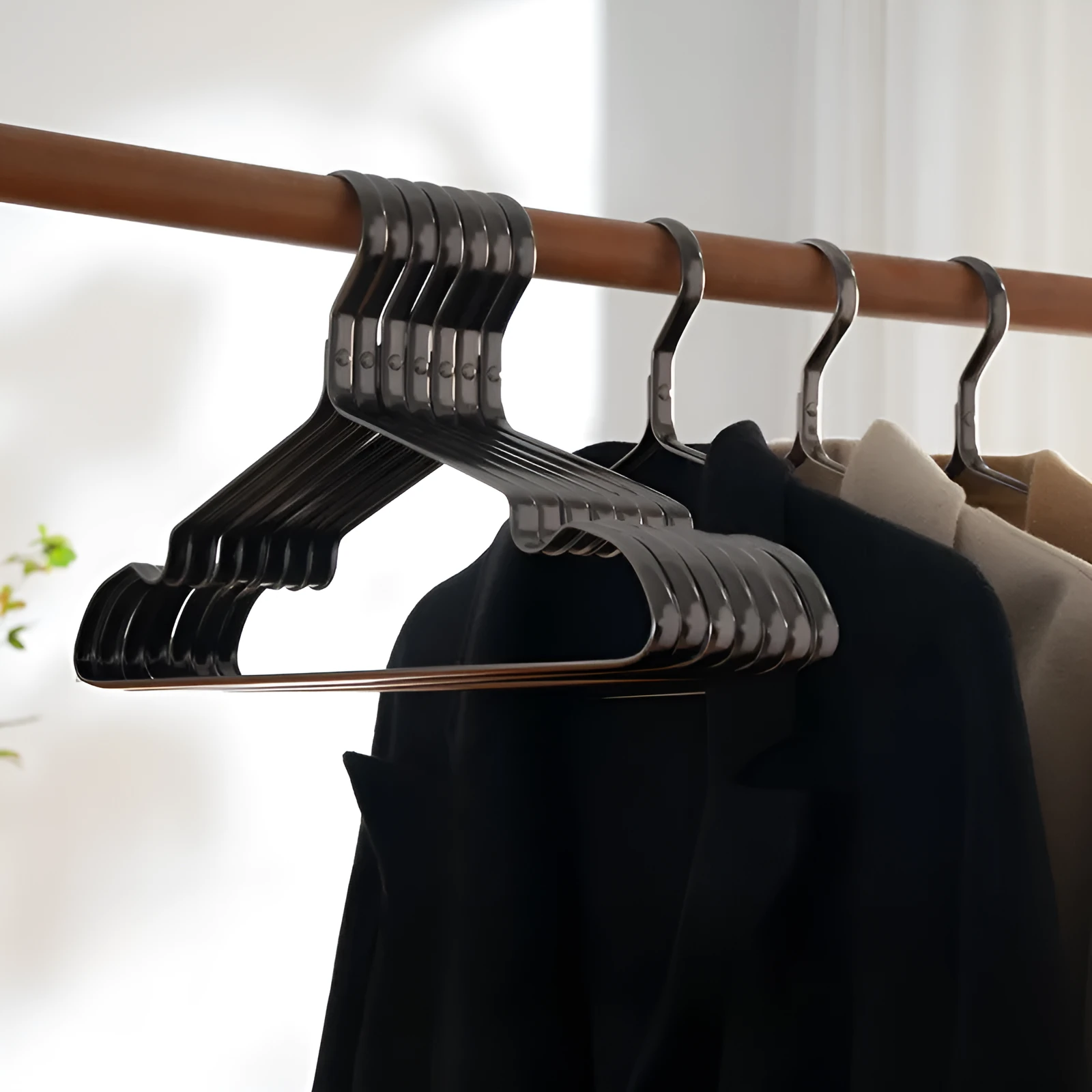 Elegant black non-slip anti-rust clothes hanger with a modern simplicity design.