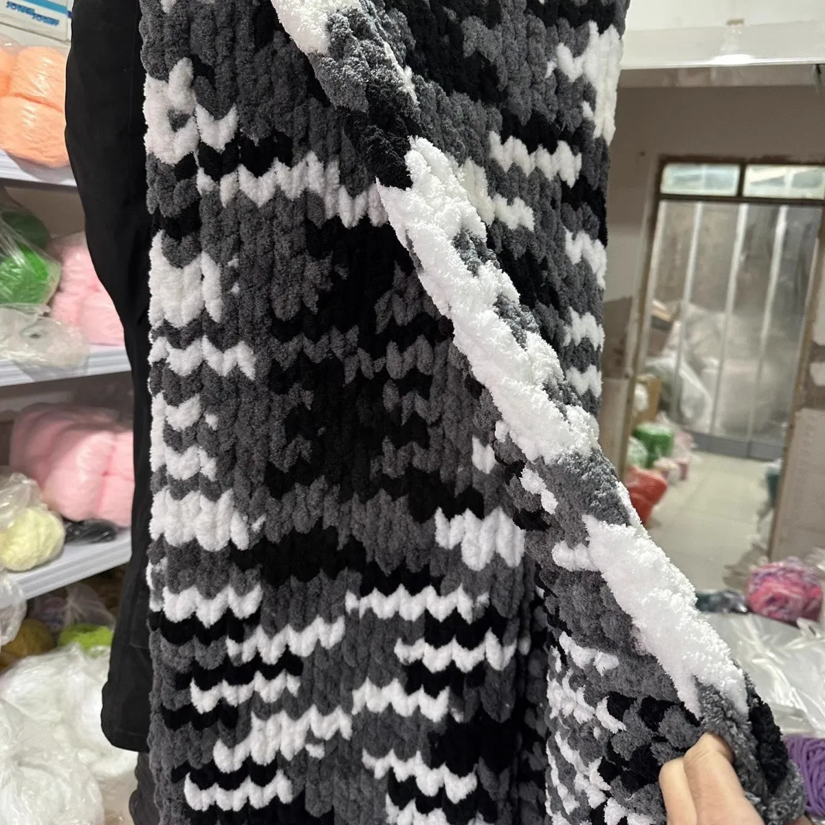 Coarse yarn chenille knitted blanket with braided gravity design in multiple colour options