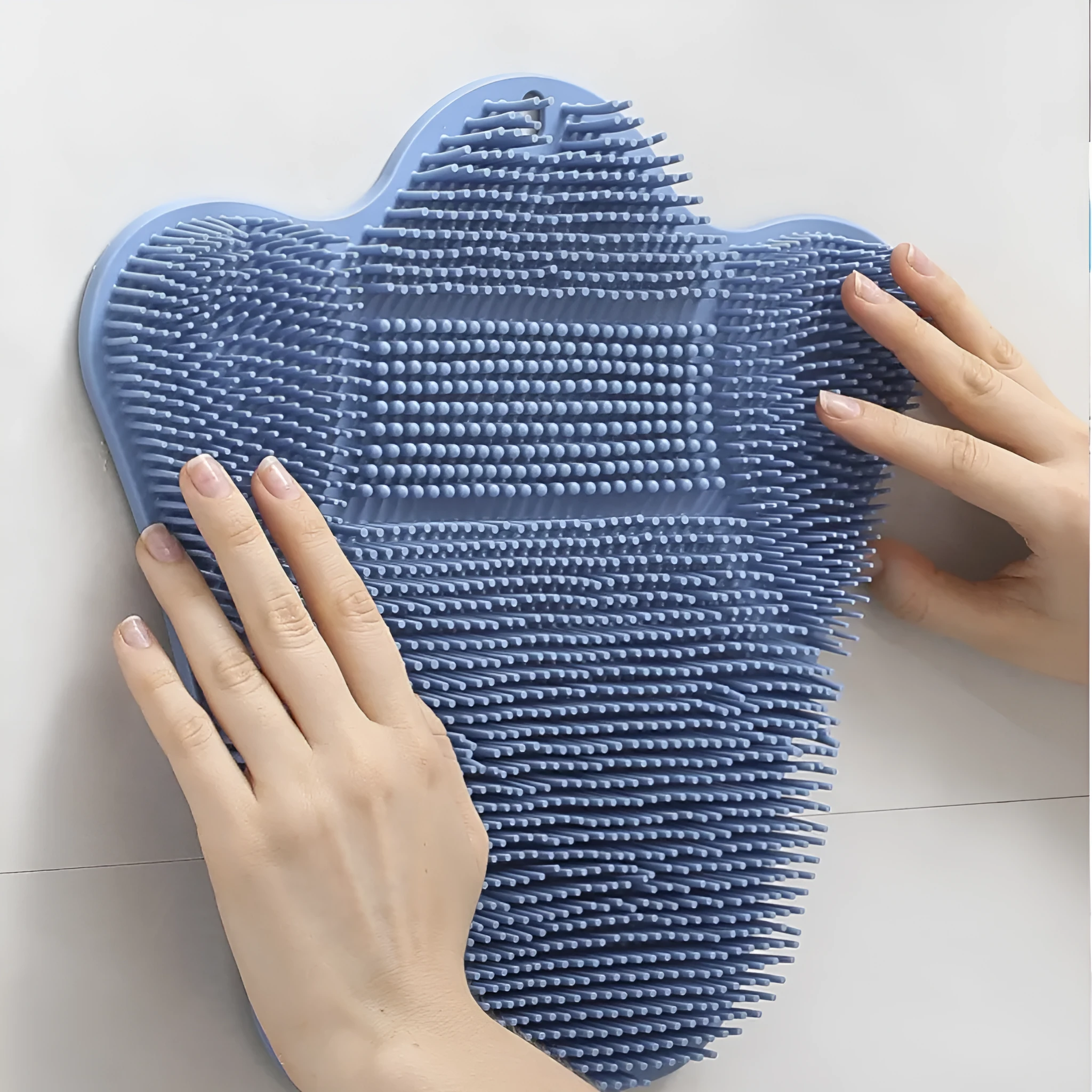 Blue silicone bath massage mat measuring 31x32cm with textured surface and suction cups for back rubbing