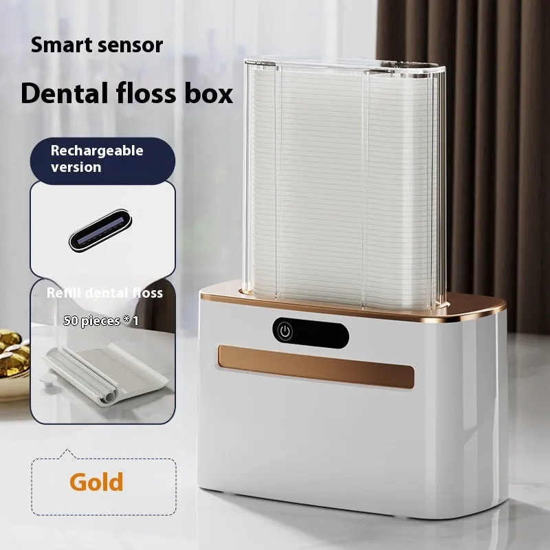 Dark gray automatic electric dental floss box with pop-up floss dispenser on a bathroom counter.