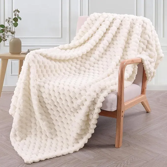 Children's soft plaid polyester blanket shown in camel colour, suitable for nap time.